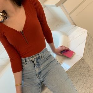 express ribbed orange v neck with front zip